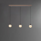 modern-sylvana-led-mini-pendant-light-with-glass-sphere-and-pearl-black-finish-for-kitchen-island