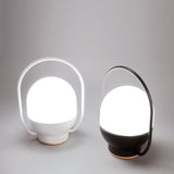 Portable LED Table Lamp with Glass Shade and Integrated Metal Handle for Indoor Use
