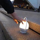 Portable LED Table Lamp with Glass Shade and Integrated Metal Handle for Indoor Use
