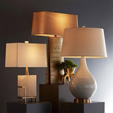 modern-brass-table-lamp-with-white-tapered-fabric-shade-and-natural-alabaster-base