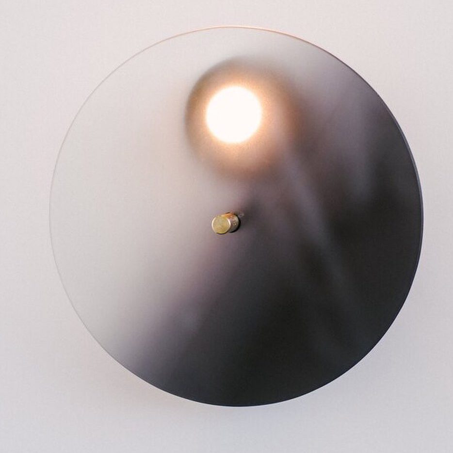 modern-interactive-glass-disc-table-lamp-with-rotating-brass-shaft-and-dimming-control