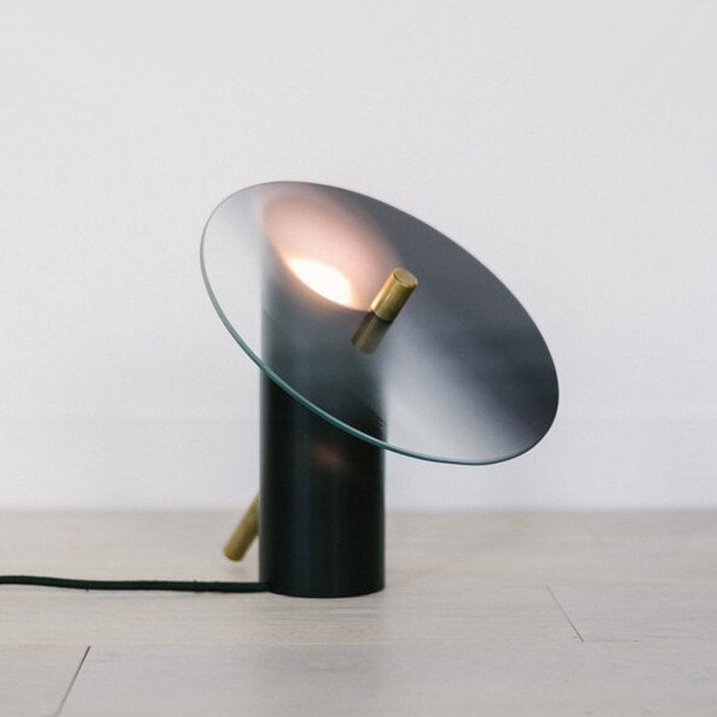 modern-interactive-glass-disc-table-lamp-with-rotating-brass-shaft-and-dimming-control