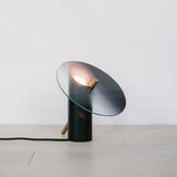modern-interactive-glass-disc-table-lamp-with-rotating-brass-shaft-and-dimming-control
