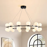 modern-led-ring-chandelier-with-milky-white-glass-shades-and-black-steel-frame-for-living-room