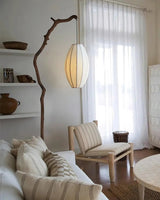 sculptural-tree-branch-standing-floor-lamp-with-elegant-fabric-lantern-shade