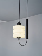 modern-triple-puck-led-pendant-light-with-ice-glazed-glass-diffuser-and-machined-iron-base