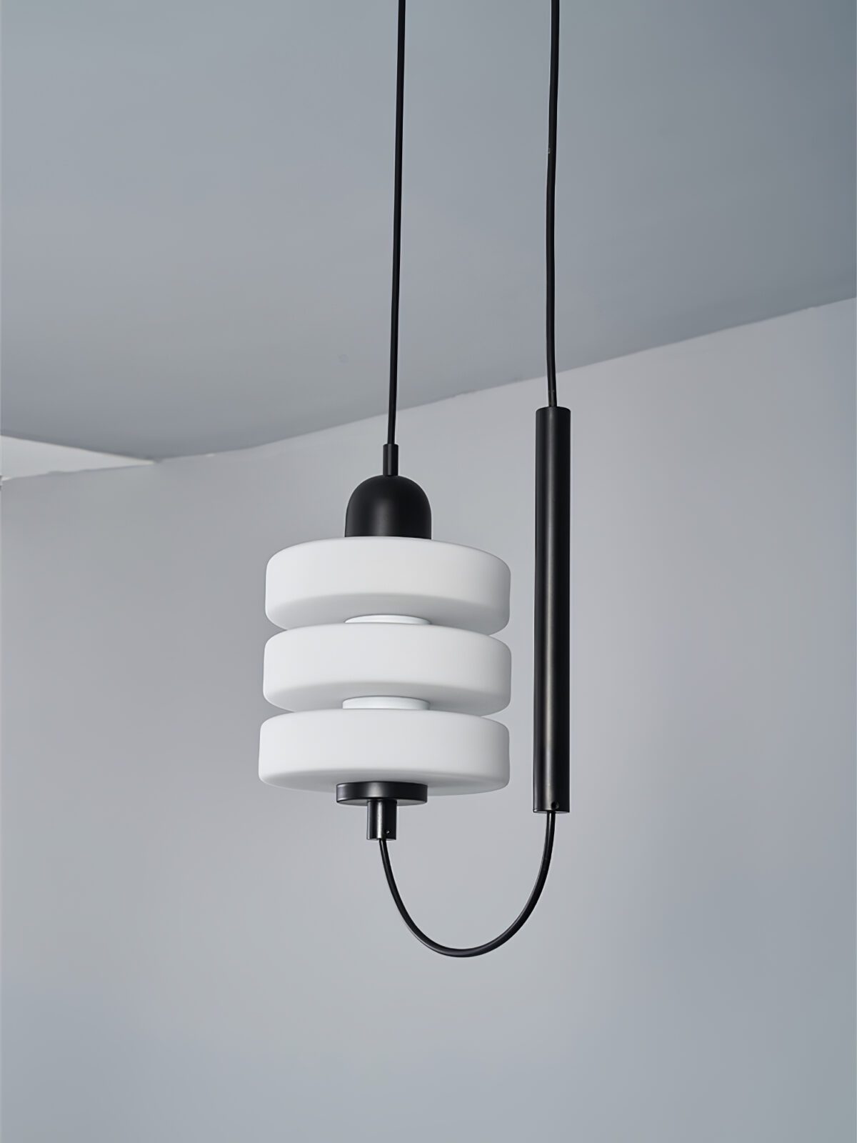 modern-triple-puck-led-pendant-light-with-ice-glazed-glass-diffuser-and-machined-iron-base