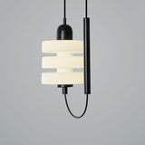 modern-triple-puck-led-pendant-light-with-ice-glazed-glass-diffuser-and-machined-iron-base