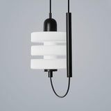 modern-triple-puck-led-pendant-light-with-ice-glazed-glass-diffuser-and-machined-iron-base