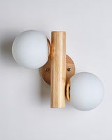 modern-tupelo-double-wooden-wall-sconce-with-rotatable-white-glass-shades-set-of-2-lighting