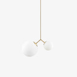 modern-asymmetric-glass-globe-pendant-light-with-brass-accents-and-hand-blown-glass
