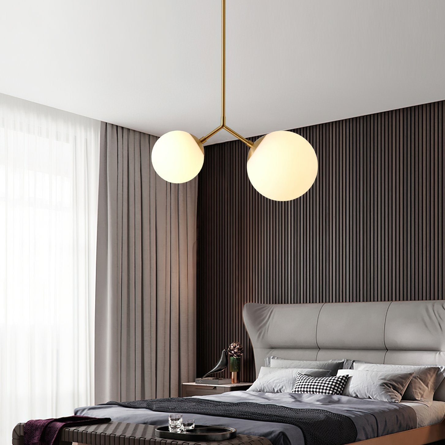 modern-asymmetric-glass-globe-pendant-light-with-brass-accents-and-hand-blown-glass