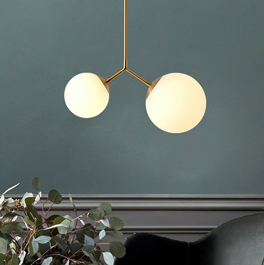 modern-asymmetric-glass-globe-pendant-light-with-brass-accents-and-hand-blown-glass