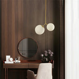 modern-asymmetric-glass-globe-pendant-light-with-brass-accents-and-hand-blown-glass