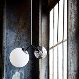 modern-asymmetric-glass-globe-pendant-light-with-brass-accents-and-hand-blown-glass