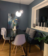modern-asymmetric-glass-globe-pendant-light-with-brass-accents-and-hand-blown-glass