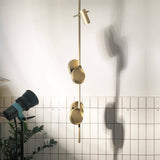 typography-cilon-disc-minimalist-led-pendant-lamp-sculptural-vertical-lighting-for-modern-living-space