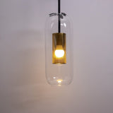 modern-vadim-glass-wall-sconce-with-perforated-metal-cage-and-brass-finish-for-luxury-interiors