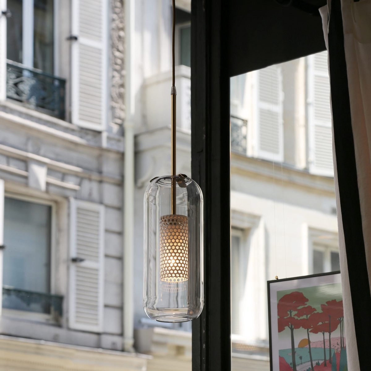 vadim-modern-glass-globe-pendant-light-with-gold-steel-rod-and-perforated-cage