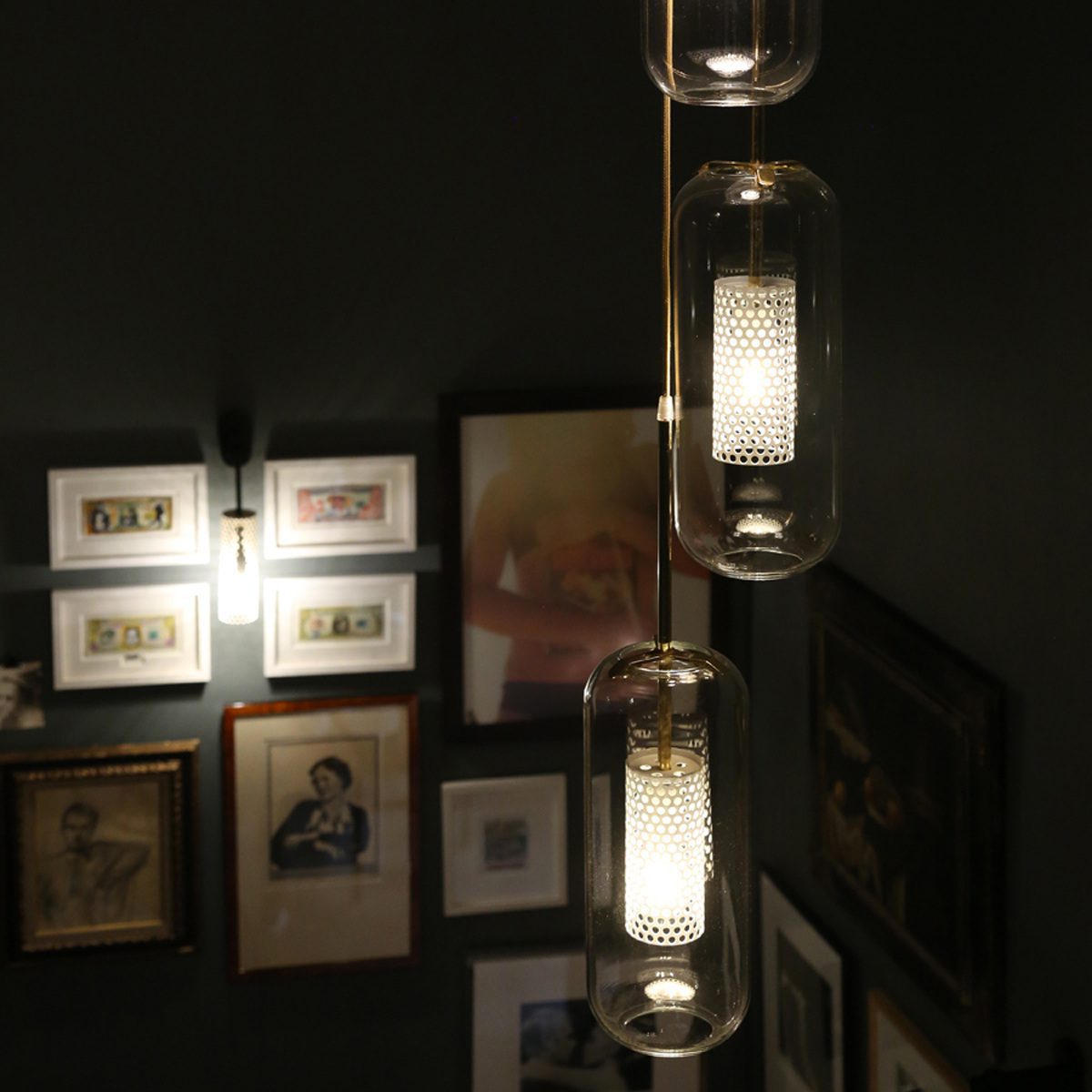 vadim-modern-glass-globe-pendant-light-with-gold-steel-rod-and-perforated-cage