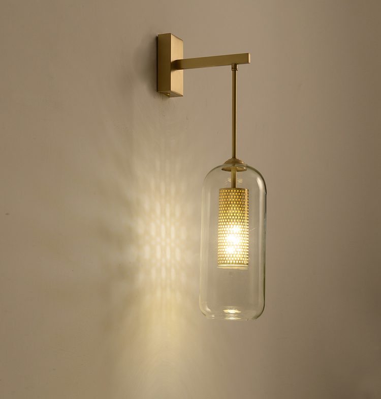modern-vadim-glass-wall-sconce-with-perforated-metal-cage-and-brass-finish-for-luxury-interiors
