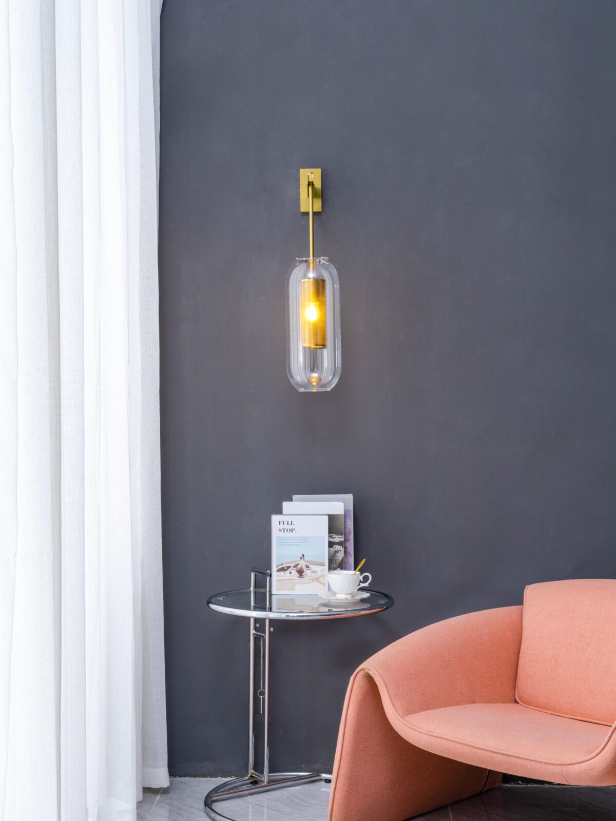 modern-vadim-glass-wall-sconce-with-perforated-metal-cage-and-brass-finish-for-luxury-interiors