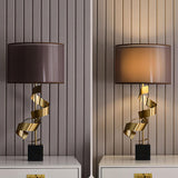 Modern Sculptural Spiral Metal Table Lamp with Gold Leaf Finish and Black Marble Base for Living Room