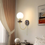 mid-century-walnut-wood-wall-sconce-lighting-with-white-glass-shade-and-pull-cord-switch