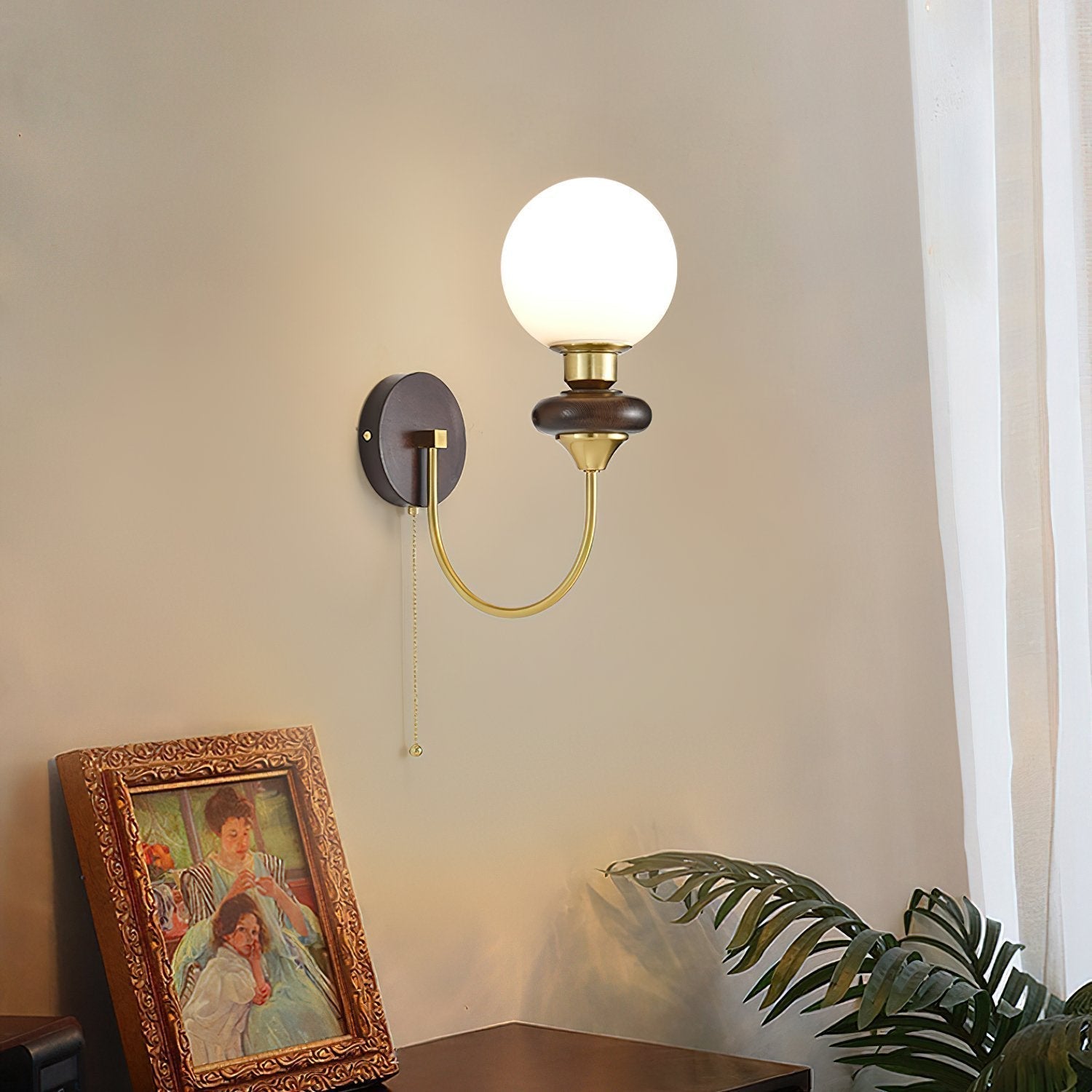 mid-century-walnut-wood-wall-sconce-lighting-with-white-glass-shade-and-pull-cord-switch