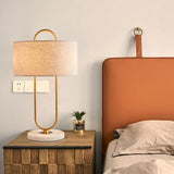 Modern Gold Bedside Table Lamp with White Linen Shade and Elegant Marble Base Design