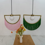 modern-bohemian-tassel-fringe-pendant-light-with-glass-globe-and-gold-metal-frame