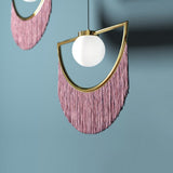 modern-bohemian-tassel-fringe-pendant-light-with-glass-globe-and-gold-metal-frame