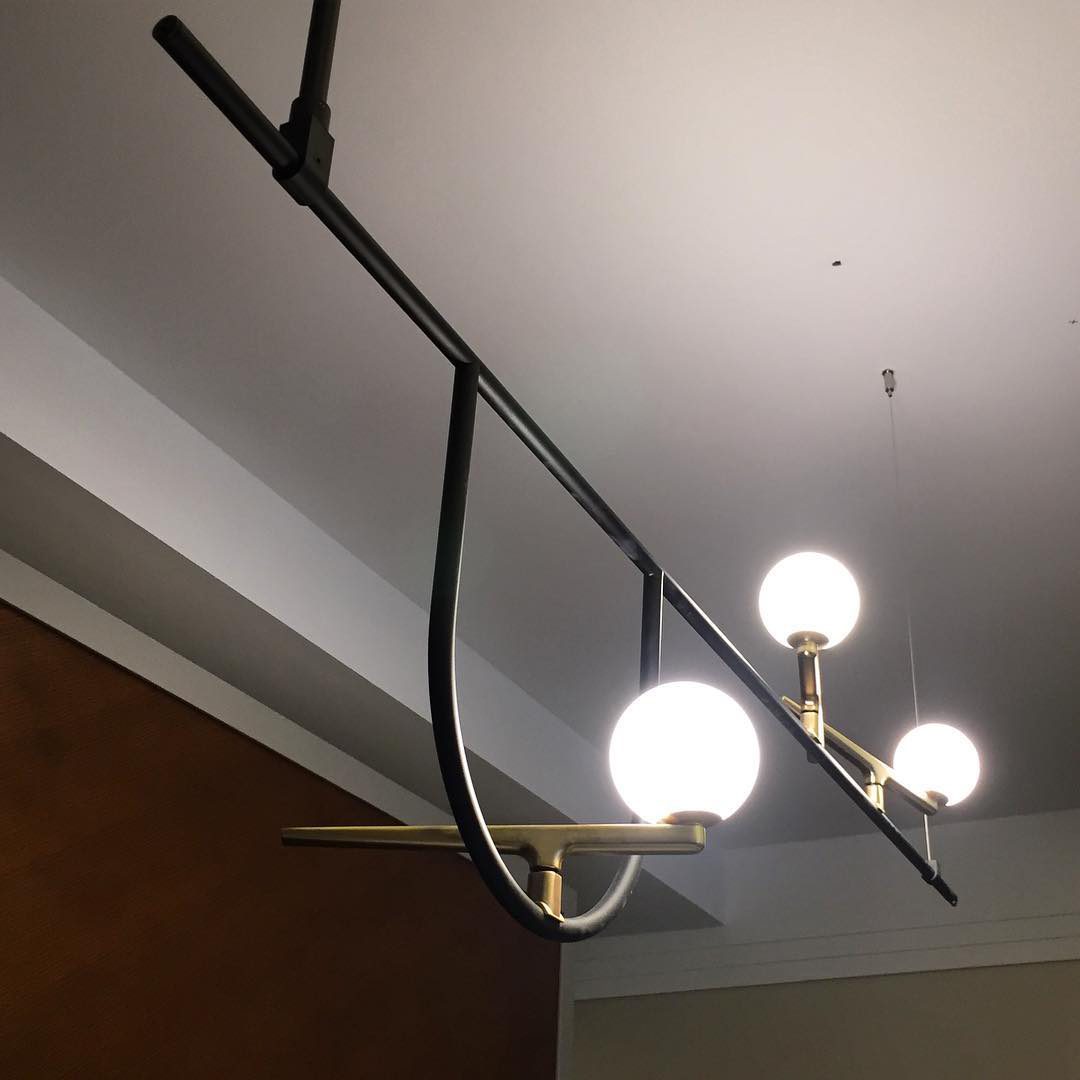 modern-minimalist-branch-chandelier-with-brass-bird-figures-and-white-glass-spheres
