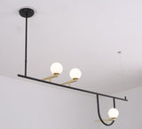 modern-minimalist-branch-chandelier-with-brass-bird-figures-and-white-glass-spheres