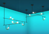modern-minimalist-branch-chandelier-with-brass-bird-figures-and-white-glass-spheres