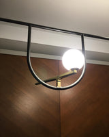 modern-minimalist-branch-chandelier-with-brass-bird-figures-and-white-glass-spheres
