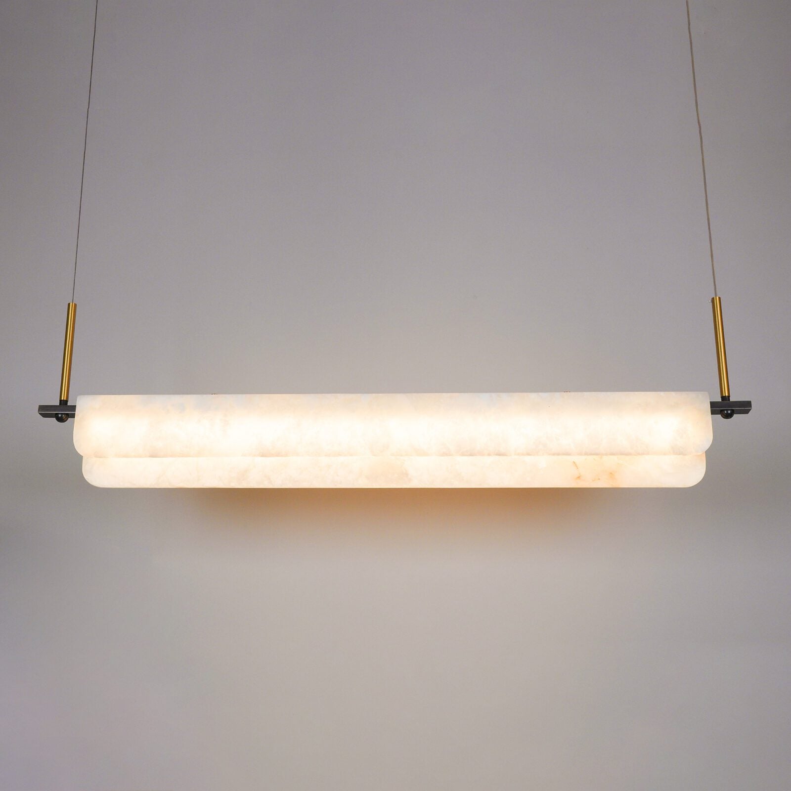 modern-linear-alabaster-led-pendant-light-with-brass-architectural-accents-for-home-dining
