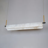 modern-linear-alabaster-led-pendant-light-with-brass-architectural-accents-for-home-dining
