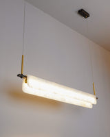 modern-linear-alabaster-led-pendant-light-with-brass-architectural-accents-for-home-dining