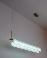 modern-linear-alabaster-led-pendant-light-with-brass-architectural-accents-for-home-dining