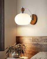 modern-walnut-wood-wall-sconce-with-globe-glass-shade-mid-century-interior-vanity-lighting