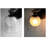 modern-industrial-black-metal-and-clear-glass-multidirectional-double-wall-sconce