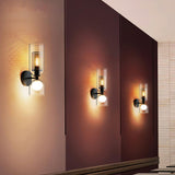 modern-industrial-black-metal-and-clear-glass-multidirectional-double-wall-sconce