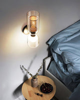 modern-industrial-black-metal-and-clear-glass-multidirectional-double-wall-sconce