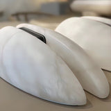 modern-symmetrical-curved-alabaster-led-wall-light-zelda-sconce-for-living-areas