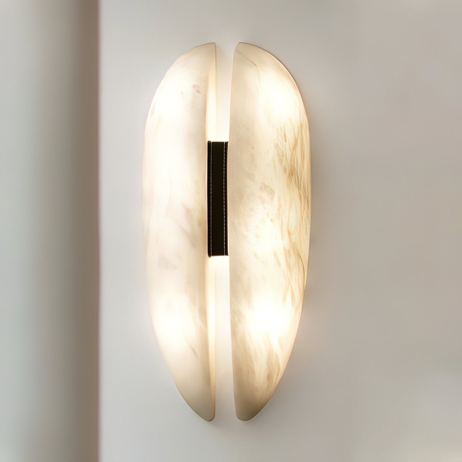 modern-symmetrical-curved-alabaster-led-wall-light-zelda-sconce-for-living-areas