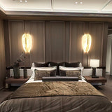 modern-symmetrical-curved-alabaster-led-wall-light-zelda-sconce-for-living-areas