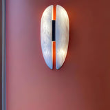 modern-symmetrical-curved-alabaster-led-wall-light-zelda-sconce-for-living-areas