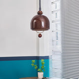 Amber Glass Dome Pendant Light with Walnut Wood Detail and Retractable Elastic Cord