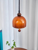 Amber Glass Dome Pendant Light with Walnut Wood Detail and Retractable Elastic Cord